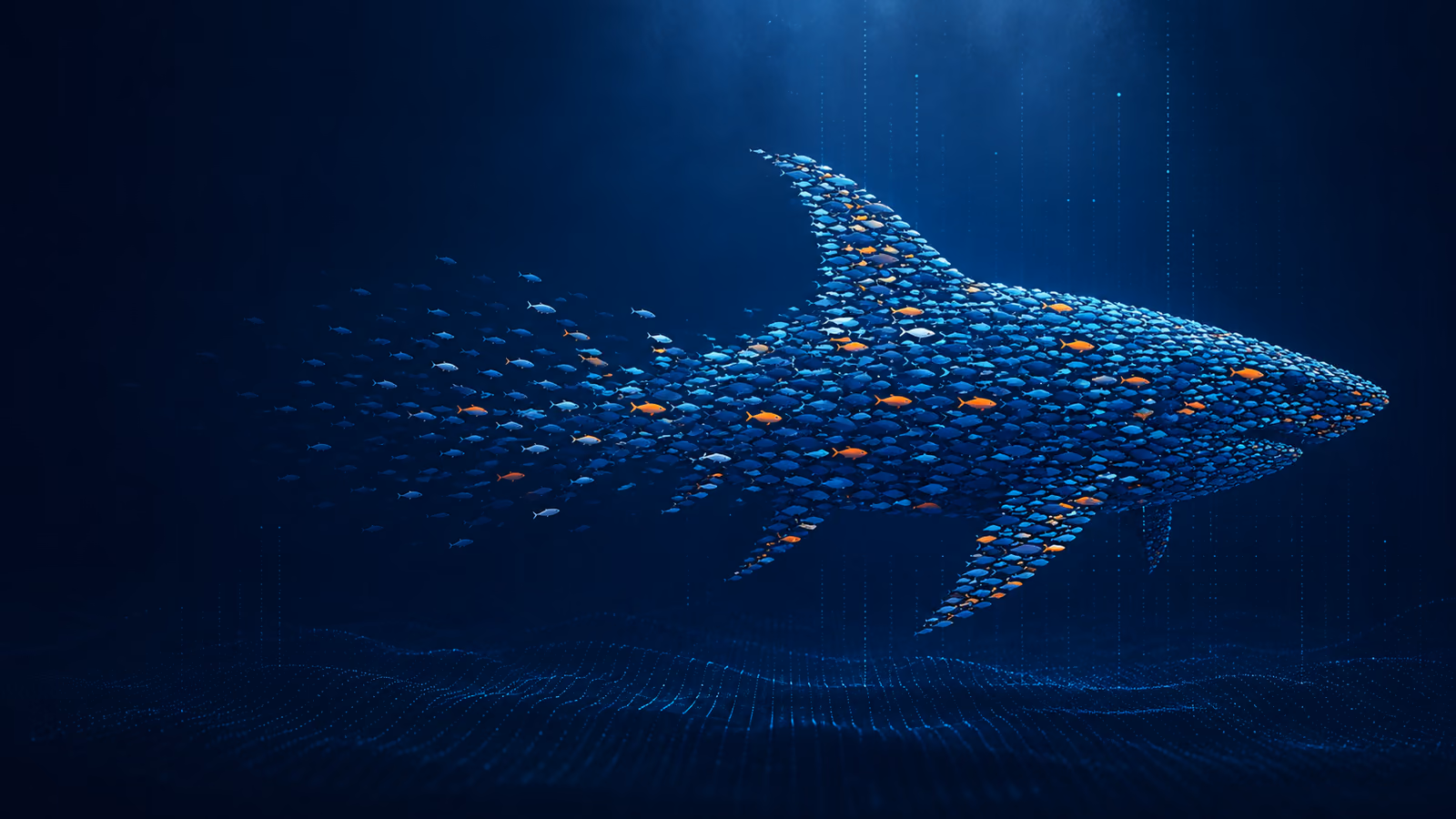 A shark formed from a school of small fish, swimming through deep blue water